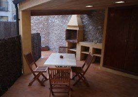 Barbecue and table on the porch 