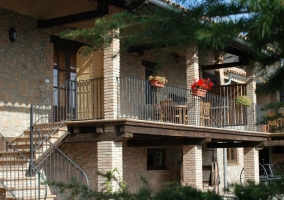 Exterior view of the accommodation with stairs and terrace 