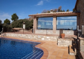 Access to the pool with views of the conservatory 