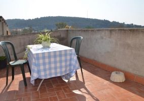  Views of the terrace with table and chairs 