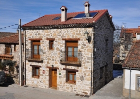 Exterior view of the building with stone walls 