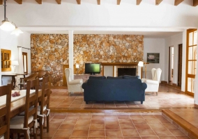  Kitchen under wooden beams with stools 