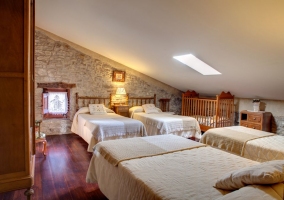  Bedroom with four single beds with cot in the rural house 