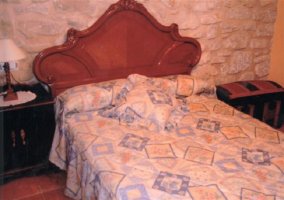  Double bedroom with antique headboard 