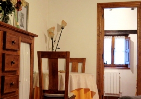  Table and furniture with crockery in the kitchen 