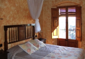  Two beds in the bedroom with stone wall 