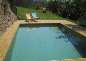  Access to the pool with wooden hammocks 