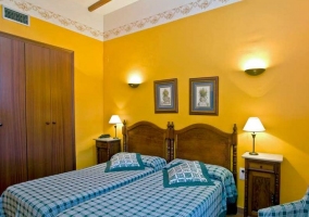  Double bedroom with wooden tables and balconies 