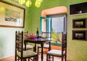  Kitchen in whites and green with fridge 