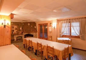  Dining room with fireplace in a corner 