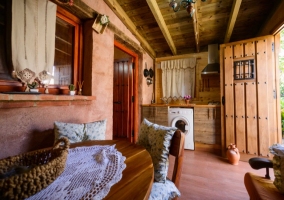  Wooden table next to the kitchen 