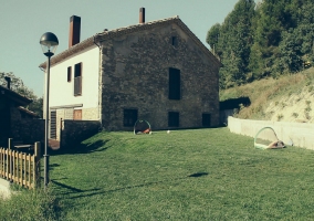  Entrance to the house with armchairs 