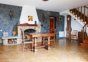  Dining room on the ground floor with its fireplace 