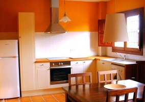  Kitchen with lots of light and table 