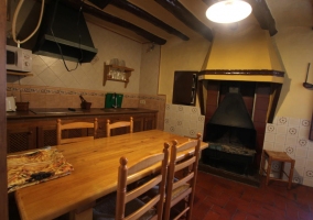 Kitchen with barbecue oven 