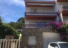 Large exterior of the house with terraces 