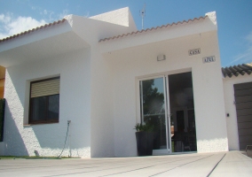  Large exteriors of the house with pool at night 