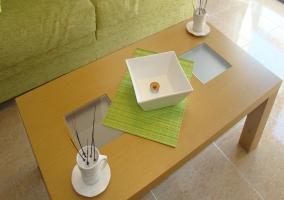  Living room with green armchairs 