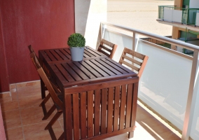  Large terrace with wooden table 