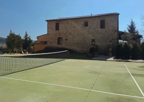  Large tennis area with stone facade 