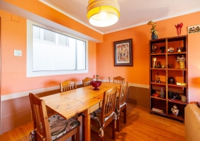  Living room with wooden table and armchairs 