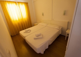  Bedroom with a bunk bed and wooden structure 