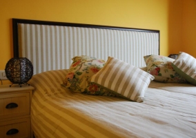  Double bed with fabric headboard 