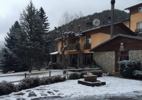 Wide entrance to the accommodation with snow 