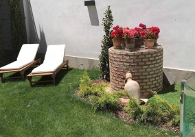  Patio with an original fountain on the right 