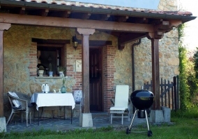  Exterior porch of the house with mobile barbecue 