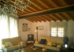  Attic living room with many armchairs 